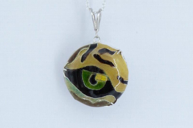 Cloisonné enamel tiger's eye pendant in cat's claw silver mount