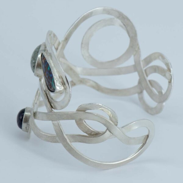 Designer Silver Cuff Bangle with Gemstones inside