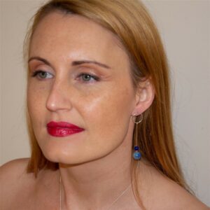 Designer Blue & Silver Circle Dangling Earrings worn
