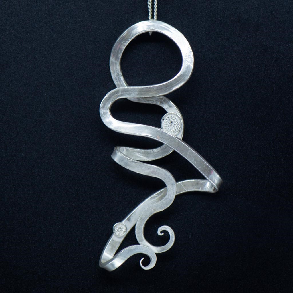 Gender neutral silver & filigree pendant hanging