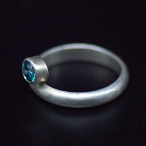 Silver Ring with Turquoise Cubic Zirconium side view