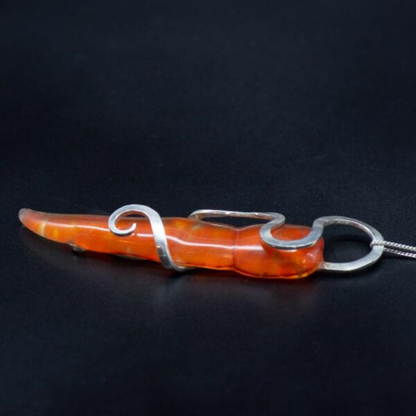 recycled silver and tapered orange glass pendant on its side