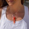 recycled silver and tapered orange glass pendant worn