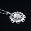 Elegant filigree floral pendant side