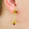 Personalised gold filigree mix and match earrings showing garnet and filigree combinations