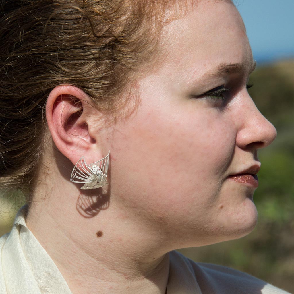 stylish layered silver filigree wedding earrings worn