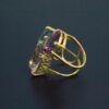 Sustainable statement cluster gold ring side
