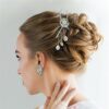 Silver filigree wedding hair pin on a model