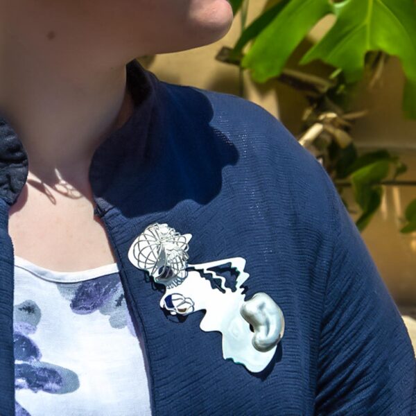 Plique-a-jour enamel & pearl sculptural brooch worn