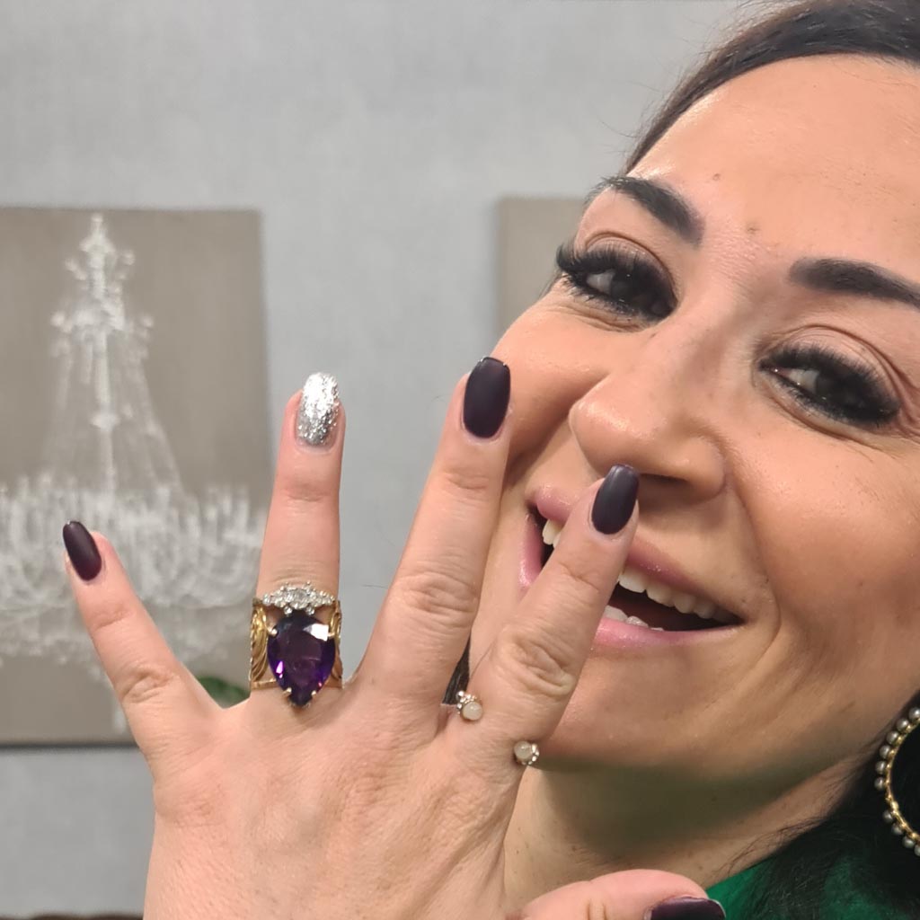 Redesigned heirloom amethyst diamond and filigree gold ring worn by Maltese celebrity TV presenter