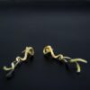Bespoke dangling gold helix earrings side