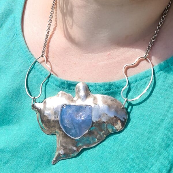 Comino Blue Lagoon Silver Pendant worn