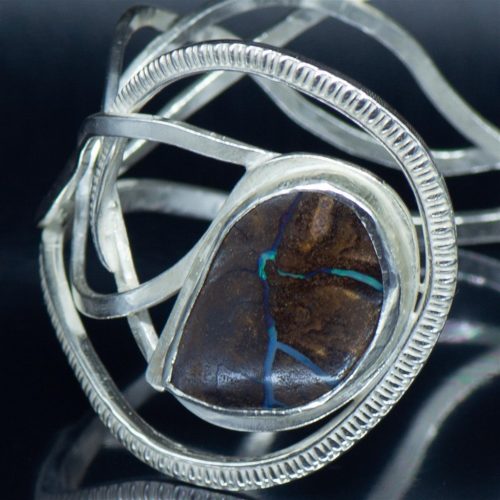 Remodelled heirloom silver bracelet with veined opal Remodelled heirloom silver bracelet with veined opal closeup